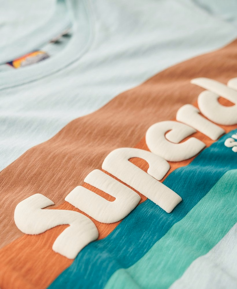 テレインロゴストライプリラックスTシャツ