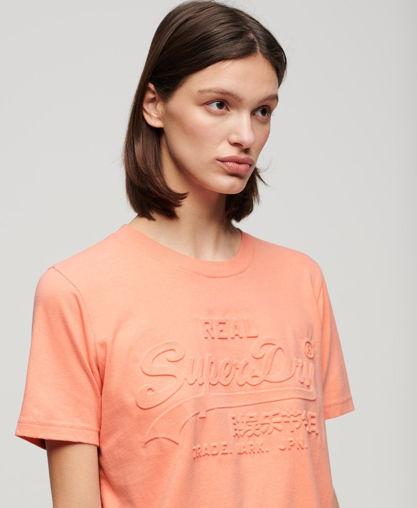 パパイヤパンチピンクのエンボス加工リラックスtシャツ
