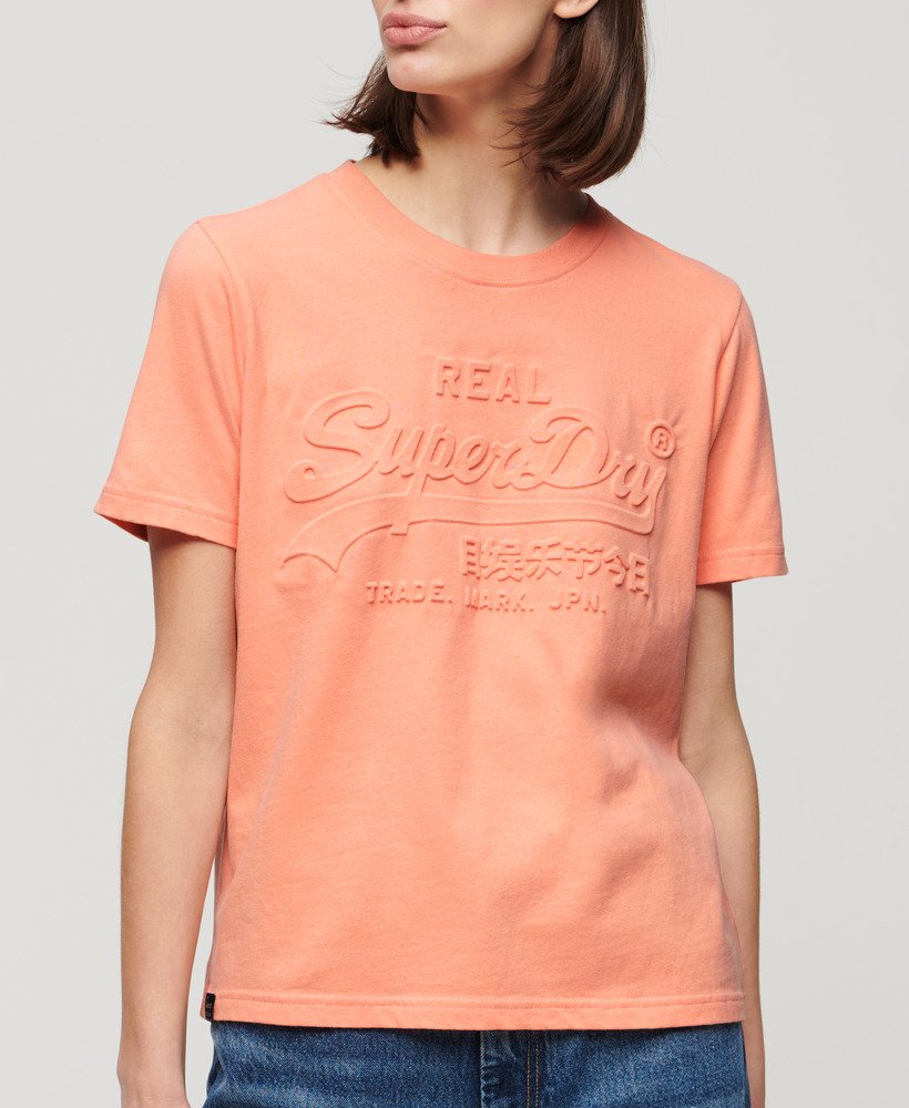 パパイヤパンチピンクのエンボス加工リラックスtシャツ